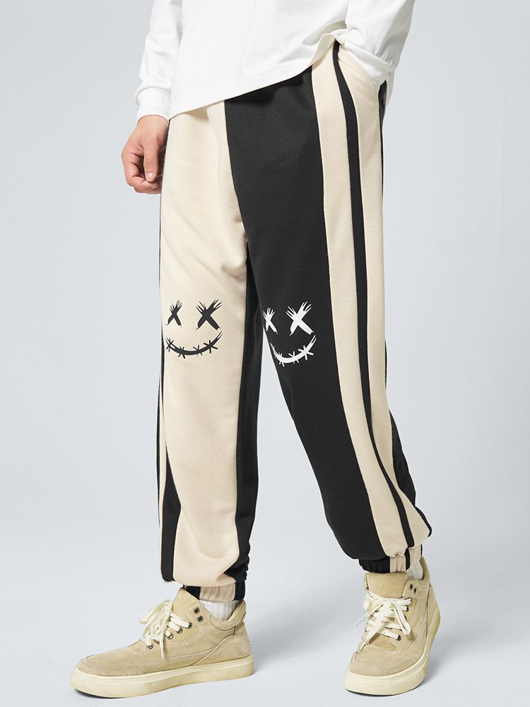 ChArmkpR Mens Smile Face Print Contrast Patchwork Loose Cuffed Sweatpants