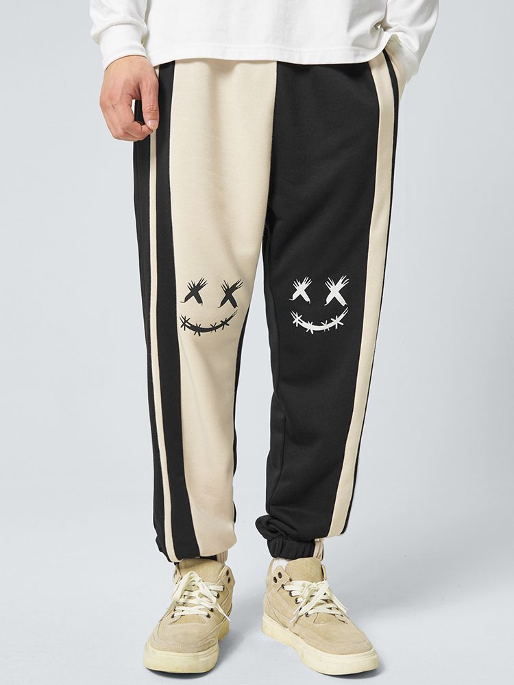 ChArmkpR Mens Smile Face Print Contrast Patchwork Loose Cuffed Sweatpants