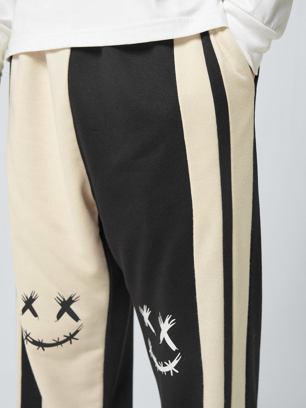 ChArmkpR Mens Smile Face Print Contrast Patchwork Loose Cuffed Sweatpants